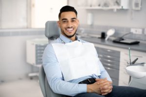 Happy, smiling man in dental treatment chair